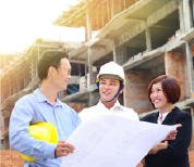 Construction team reviewing a building plan