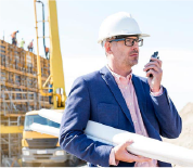 Construction manager on-site with radio